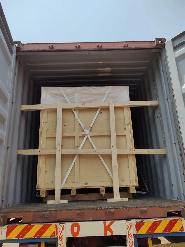 Export wooden crate braced with timber and straps inside a container